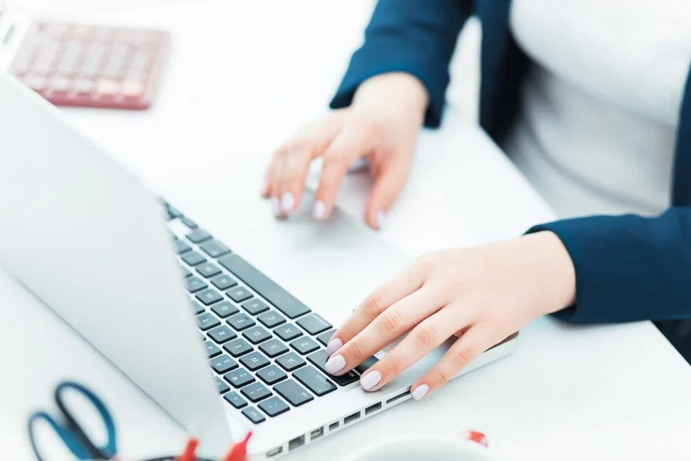 female-hands-keyboard-her-laptop-computer_155003-6643